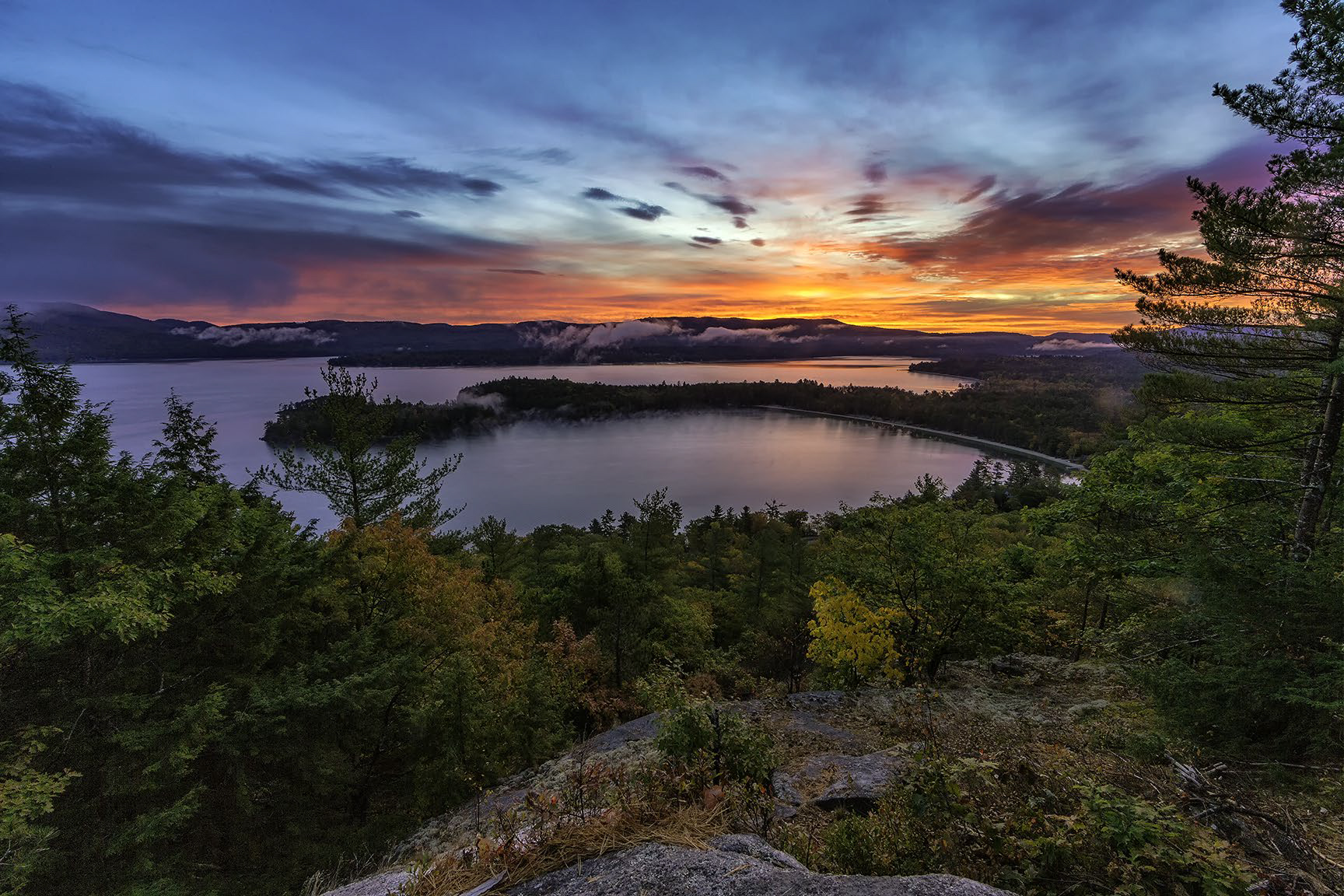 View of Newfound Lake in NH at sunset