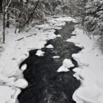 snow covered river in Bristol NH