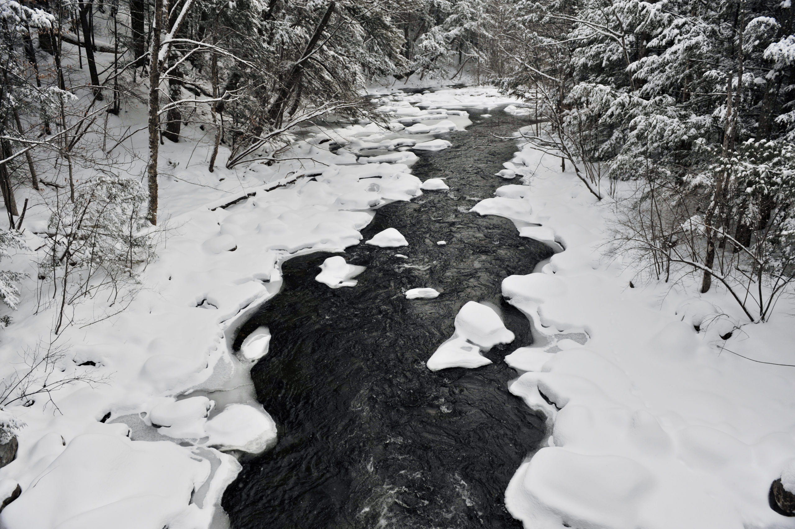 snow covered river in Bristol NH