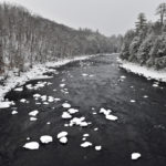 river in winter lakes region nh