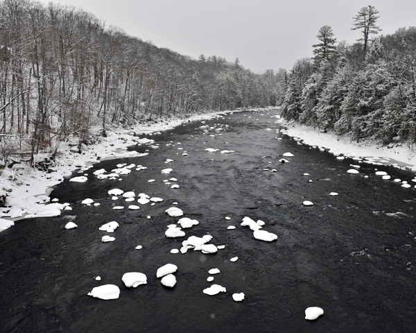 river in winter lakes region nh