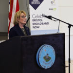 Sen Maggie Hassan at a podium speaking at the Bristol Broadband Now ribbon cutting