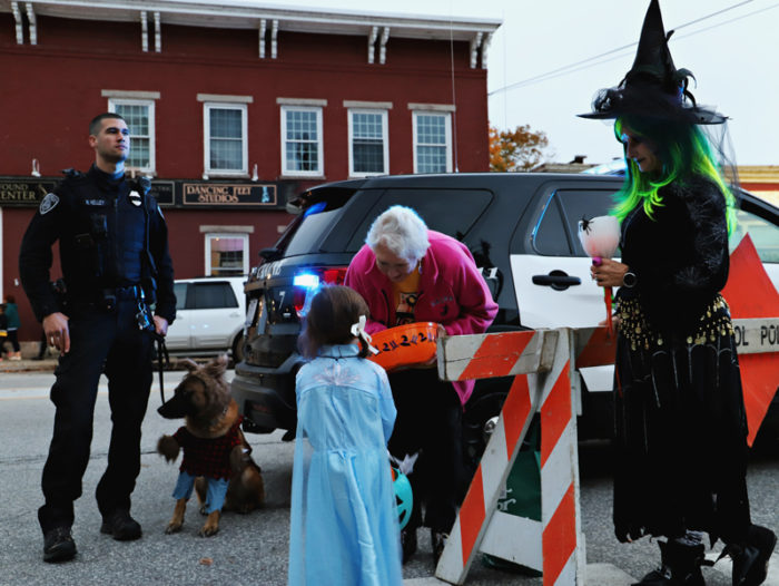 Girl dresses as a princess trick-or-treating in downtown Bristol NH