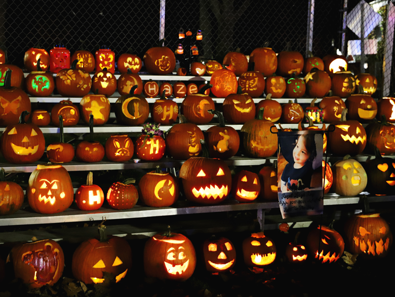 Jack-o-lantern display at night, located in Bristol, NH